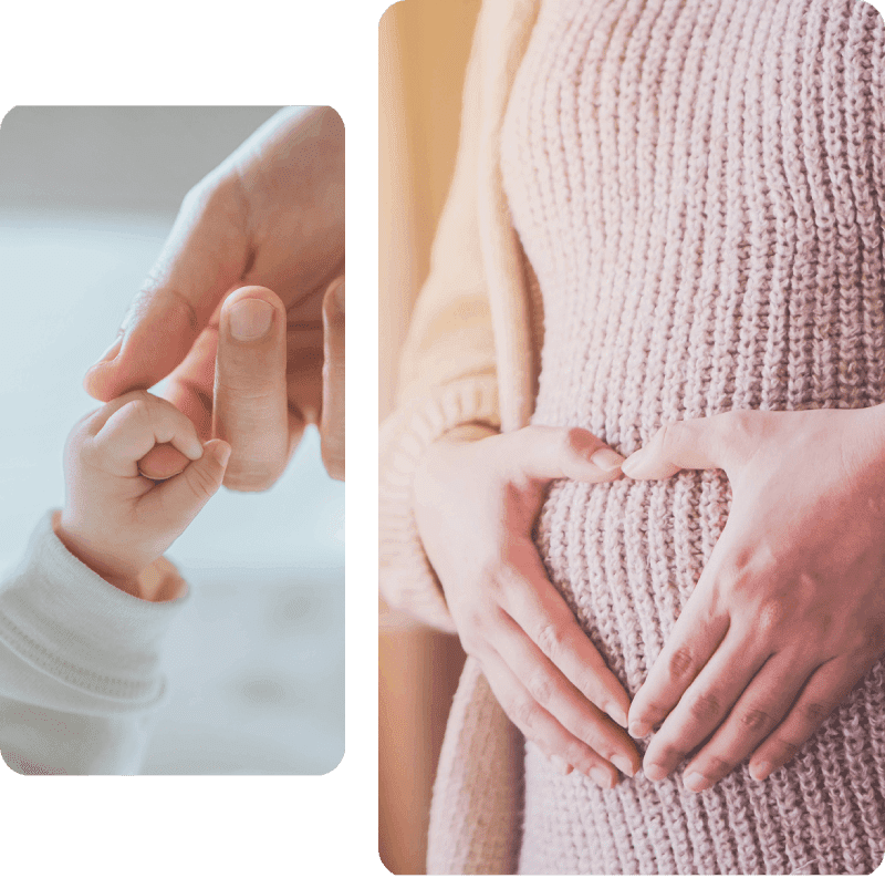 Baby hand and pregnant woman holding belly.